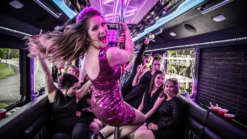 Guests dancing inside a Miami party bus